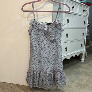 Spaghetti strap light blue dress with design.